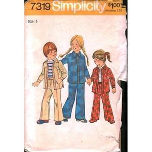 May include: Simplicity pattern 7319 for children's clothing, size 5. The pattern features illustrations of three children wearing outfits: a tan suit, a blue plaid outfit, and a red floral suit. The pattern envelope is yellow and white.