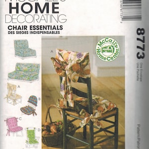 May include: A sewing pattern for chair covers featuring a fruit print. The pattern includes instructions for making a chair back cover, a seat cushion cover, and a tie-on bow. The pattern is from McCall's Home Center.