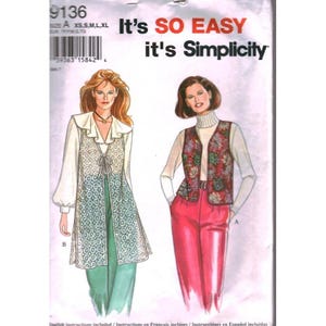 May include: Simplicity sewing pattern 9136 featuring illustrations of two outfits. One shows a long, white lace vest over a white blouse and green trousers. The other shows a floral print vest over a white turtleneck and red trousers.