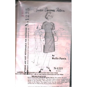 May include: A Spadea Designer Pattern N-1225 by Mollie Parnis for a dress. The packaging features a black and white illustration of a short-sleeved dress with a center back zipper and darts. Text includes pattern number, designer name, and safety warnings.