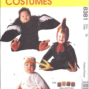 May include: A sewing pattern for three baby costumes: a black bird, a red rooster, and a white goose. The pattern is from McCall's Costumes and is size 1/2. The pattern is called "The Collection by Tom Arma."