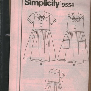 May include: Simplicity sewing pattern number 9554 for a girl's dress with a sailor collar. The pattern includes three different styles: a short-sleeved dress with a bow, a sleeveless dress with a bow and pockets, and a short-sleeved dress with a bow.