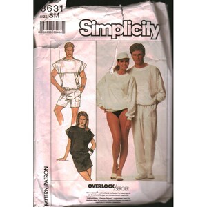 May include: A Simplicity sewing pattern envelope, number 8631, size SM. The front displays illustrations of individuals wearing various garments including a short-sleeved top, shorts, a sweatshirt, and long pants. The text includes Simplicity, 8631, SIZE SM, and OVERLOCK/SERGER.