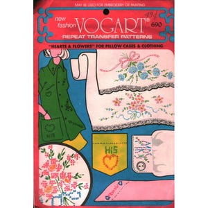 May include: A Vogart repeat transfer pattern packet for embroidery or painting, labeled Hearts & Flowers for pillow cases and clothing. The packaging features illustrations of floral designs, a green shirt with pockets, and text including His and Yours.