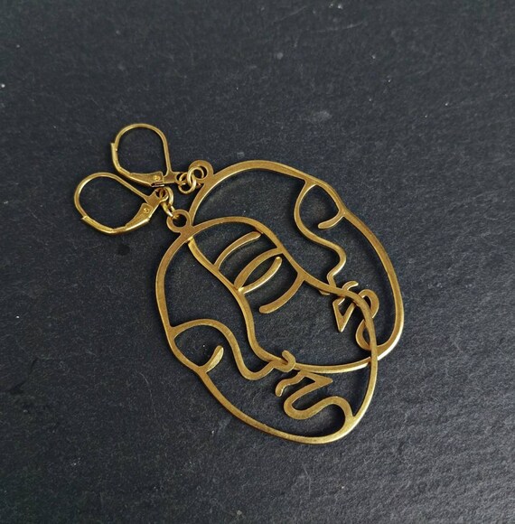 Abstract face outline deals earrings