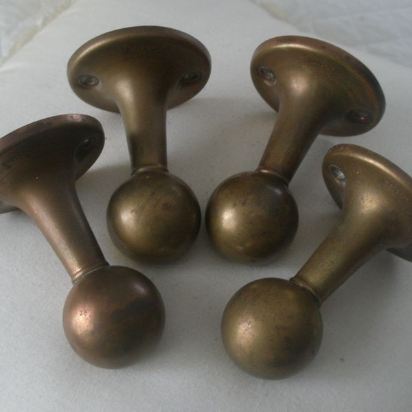Two Antique Sets of Brass Towel Bar Holders