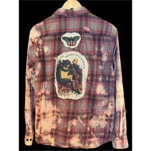 May include: A set of three ceramic mugs with a speckled, matte finish. The mugs are in shades of cream, light gray, and dark gray. Each mug has a simple, minimalist design, perfect for coffee or tea.