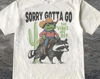 Vintage 90s Style Cowboy Frog Riding Raccoon Shirt, The Vibes Off Weird Tee, Western Tee, Sarcastic Wild West Graphic Top, Animal Lover Tee