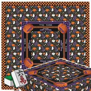 May include: A square Halloween-themed Mahjong game mat with a black background, orange pumpkins, white ghosts, and purple flowers. The mat has a black and orange checkered border and the words "Walls Left" and "Play Right". A set of Mahjong tiles is in the corner.