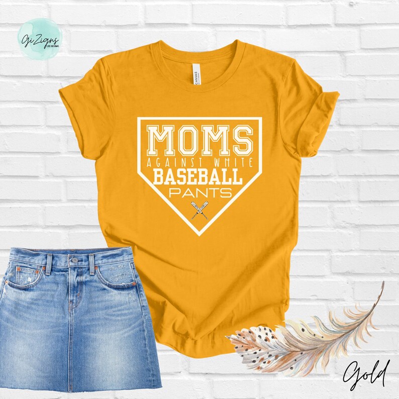 May include: A yellow t-shirt with a white baseball diamond graphic that says "Moms Against White Baseball Pants".