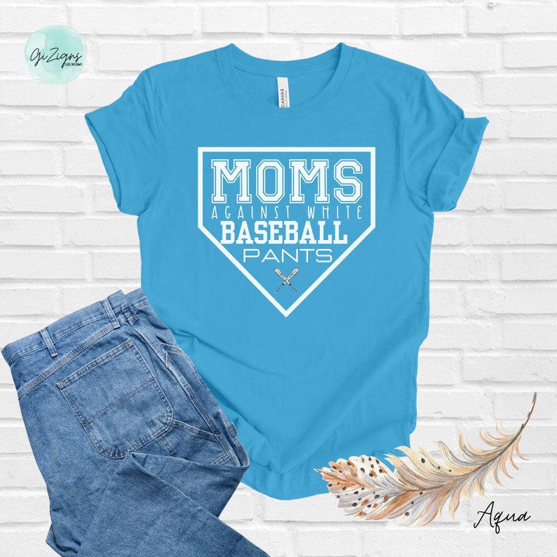 May include: A light blue t-shirt with a white baseball diamond graphic that says "MOMS AGAINST WHITE BASEBALL PANTS".