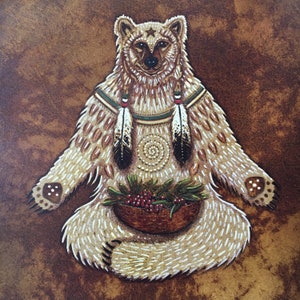 May include: A square painting featuring a stylized bear in a seated position against a mottled brown background. The bear is light brown with white fur markings, a star on its forehead, two feathers hanging from its neck, and a basket of red berries.