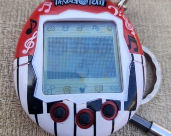 たまごっち v6 music star 海外　tamagotchi Tamagotchi Music Star Digital Virtual Pet V6 White Pink