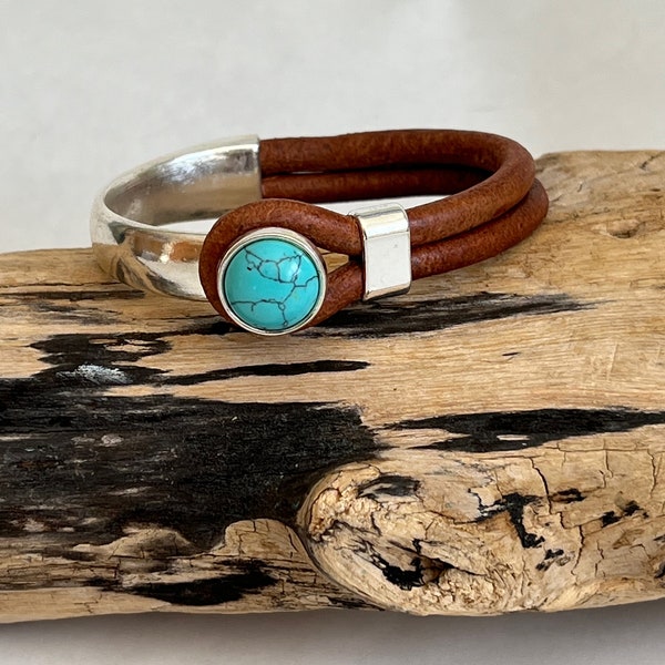 Italian rich distressed brown leather and turquoise button clasp. Half cuff style.  Gorgeous turquoise stone, soft leather and trendy clasp.
