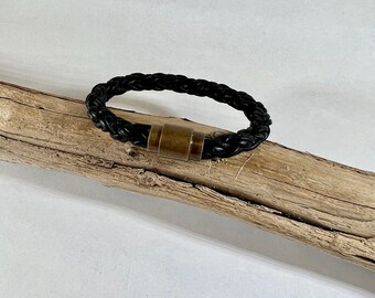 Braided leather bracelet. Thick soft black braided leather finished with a strong brass magnetic clasp.