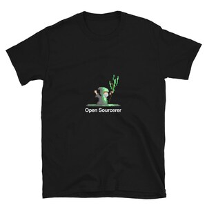May include: Black t-shirt with a green pixelated image of a wizard holding a staff and the text "Open Sourcerer".