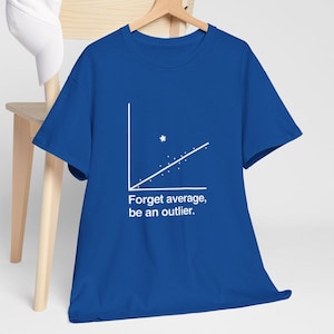 May include: A royal blue t-shirt with a white graphic of a scatter plot and the text "Forget average, be an outlier." The shirt is hanging on a wooden hanger.
