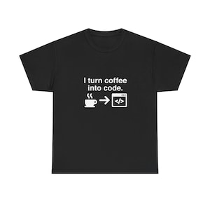 May include: Black t-shirt featuring the text "I turn coffee into code." The design includes a coffee cup, an arrow, and a code symbol in white. The shirt is a short-sleeved crew neck.