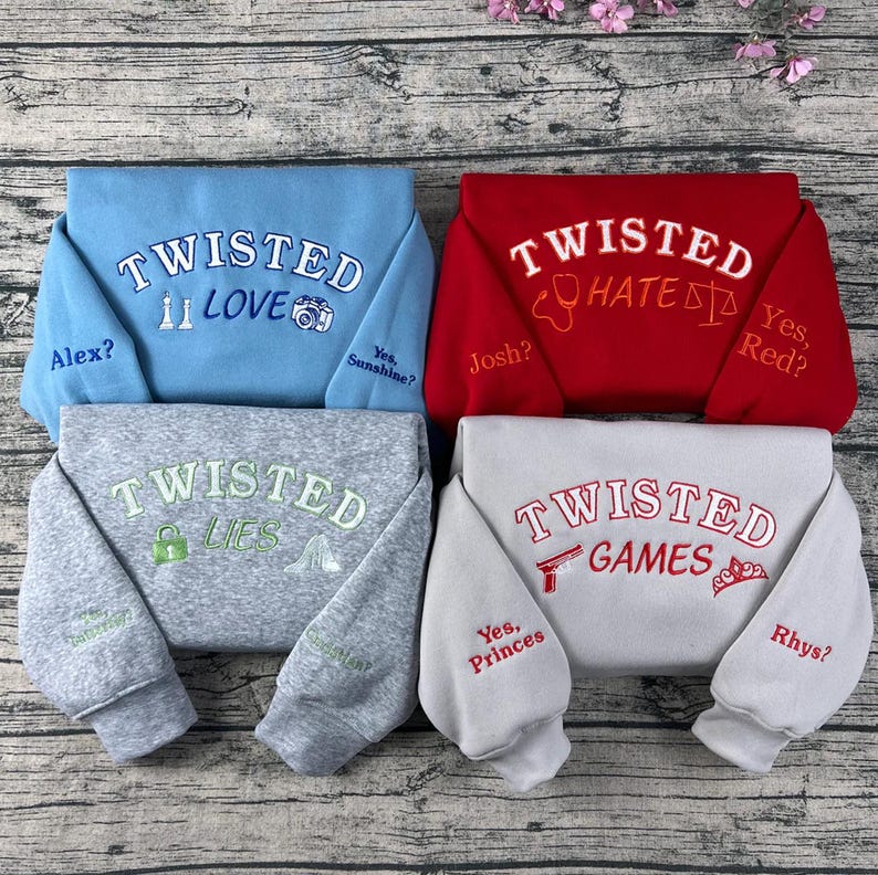 May include: Four sweatshirts in blue, red, gray, and white, each embroidered with the word "TWISTED." The blue sweatshirt says "LOVE" with a camera icon. The red sweatshirt says "HATE" with a stethoscope icon. The gray sweatshirt says "LIES" with a lock icon. The white sweatshirt says "GAMES" with a gun icon.