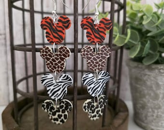 Orecchini a forma di testa di topo stampati in 3D: stile safari con stampa animalier