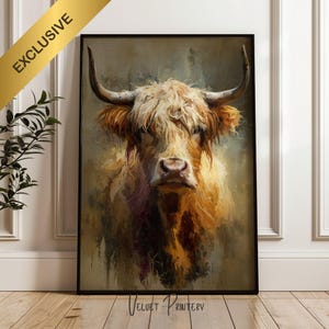 May include: A framed art print featuring a detailed portrait of a Highland cow. The artwork showcases the animal's shaggy, light brown fur and large horns against a muted background. The word "EXCLUSIVE" is printed on a gold banner in the upper left corner.