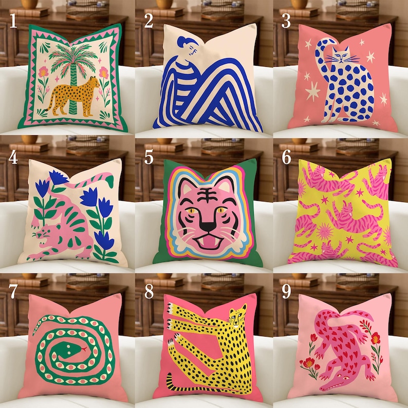 May include: Nine decorative throw cushions with vibrant, quirky designs. Cushions feature animal and human figures, including a leopard, cat, tiger, and snake. The cushions are in shades of pink, green, yellow, and blue, with floral and geometric patterns.