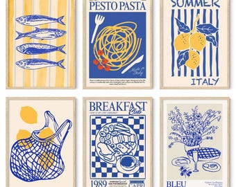 May include: Six framed art prints with a vintage aesthetic. The prints feature illustrations of fish, pasta, lemons, a breakfast plate, and flowers in blue and yellow hues. Each print has a wooden frame.