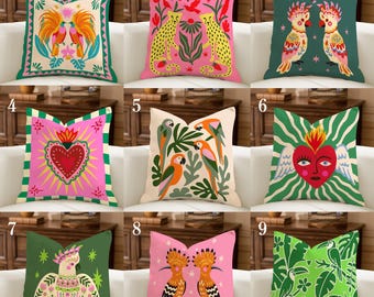 May include: A collection of nine decorative throw pillows with vibrant, colorful designs. The pillows feature various patterns, including parrots, cheetahs, and heart motifs. Each pillow has a unique design, with a mix of pink, green, and orange hues.