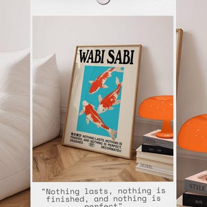 May include: A framed art print with the words "WABI SABI" and three koi fish on a light blue background. The print includes the text "Nothing lasts, nothing is finished, and nothing is perfect."