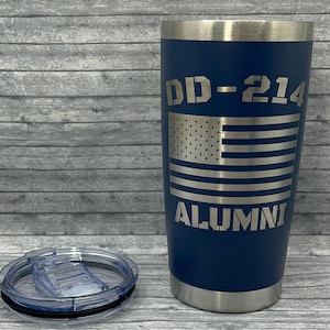 May include: A blue stainless steel tumbler with a lid. The tumbler has a silver American flag and the text "DD-214 ALUMNI" engraved on it.