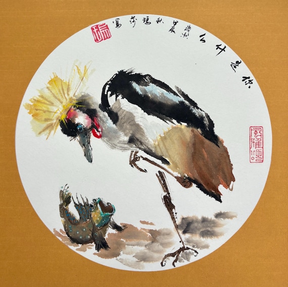 Mudskipper and grey crowned crane