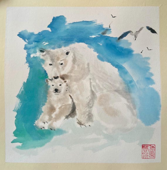 Polar bear mom and cub