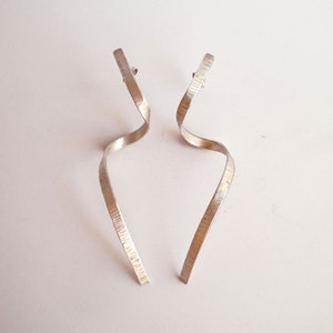 hammmered sterling silver organic  earrings, spinning around earrings,contemporary earrings, handmade silver earrings, statement earrings