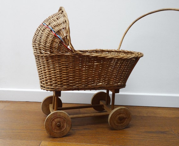 vintage wicker doll buggy