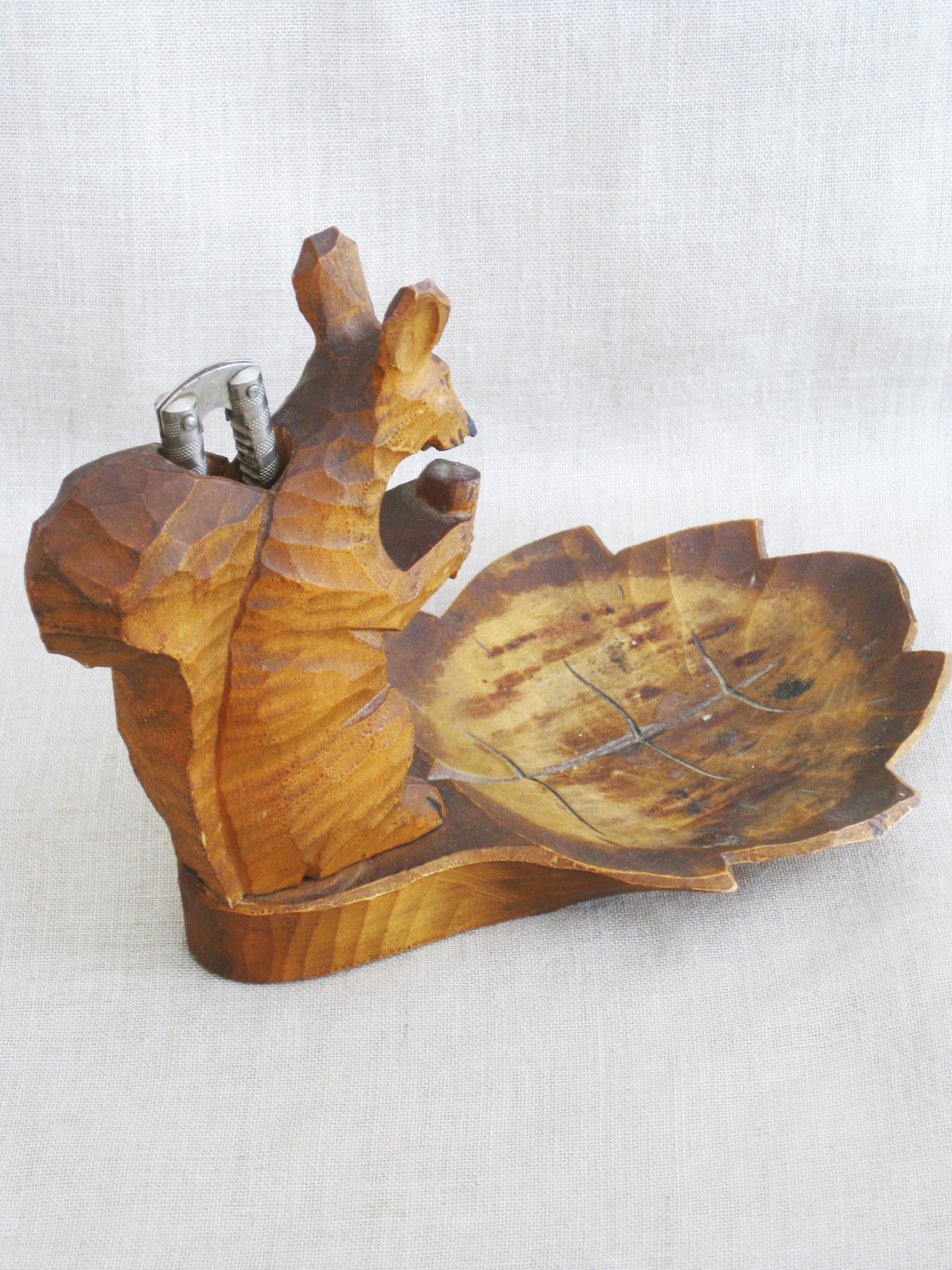 Vintage Carved Wooden Squirrel Nut Cracker on Leaf Shaped Dish, Black