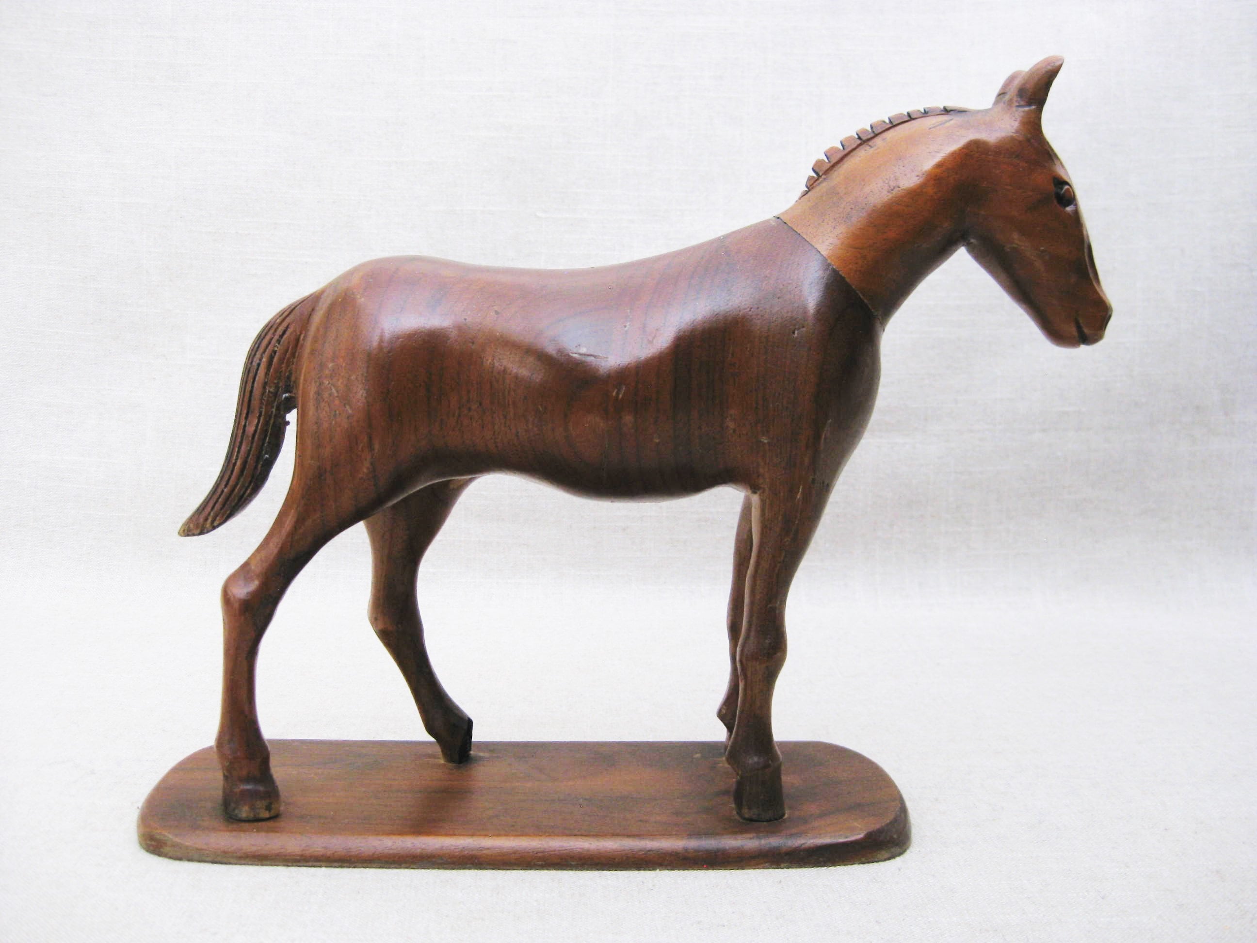 large wooden horse sculpture
