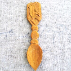 Sweet Vintage Hand Carved Folk Art Wooden Spoon, referred to as Loving Spoons, A wooden spoon carved by Welsh suitor as engagement gift for  bride. Has a delightful Bird Design  looks like a Cardinal. Piece is signed w initials, FR and dated 1994.