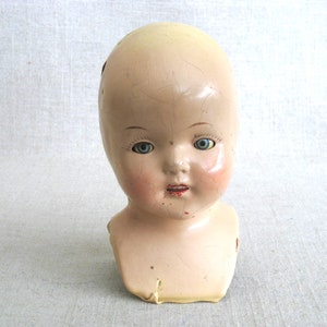 Terrific Vintage Composite Doll Head with "Shoulder Yoke. Bright Blue weighted Sleepy Eyes, perfect for all kinds of uses, from adding to a collection, to Halloween décor, or as Doll Parts and Supplies for Doll Repair to Assemblage Sculpture. Listing is for 1 doll head, other props are NOT included.