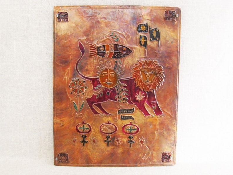 Terrific Embossed Vintage Copper Relief Panel. This Animal Art piece depicts a Lion, heavily surrounded by all kinds of intricate details, and symbolism. Mounted to a wooden panel with a wooden frame on the backside for depth and stability.
