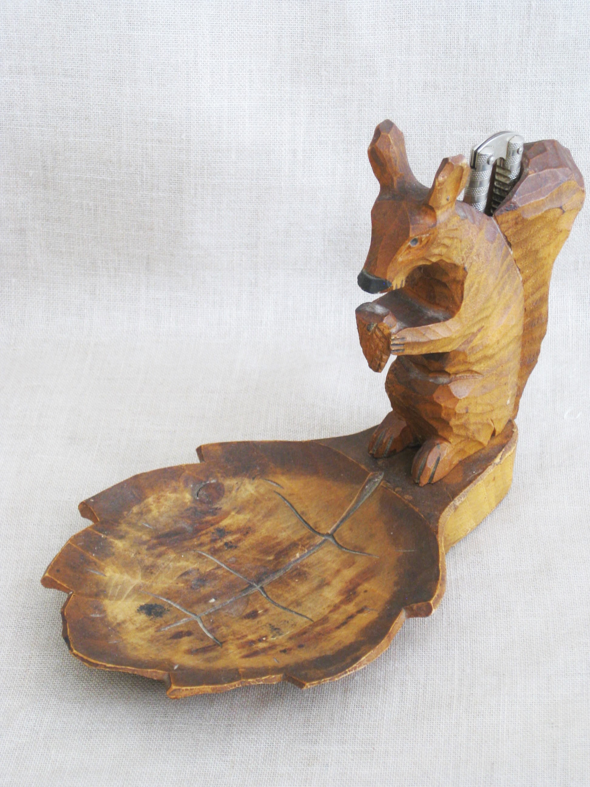 Vintage Carved Wooden Squirrel Nut Cracker on Leaf Shaped Dish, Black