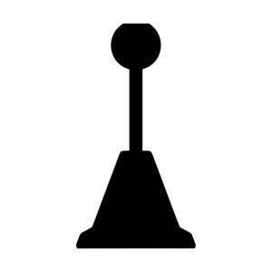May include: A solid black silhouette of a gear shift knob featuring a spherical top attached to a vertical cylindrical shaft, which is mounted onto a wide, trapezoidal base with a flat bottom edge, presented against a plain white background.