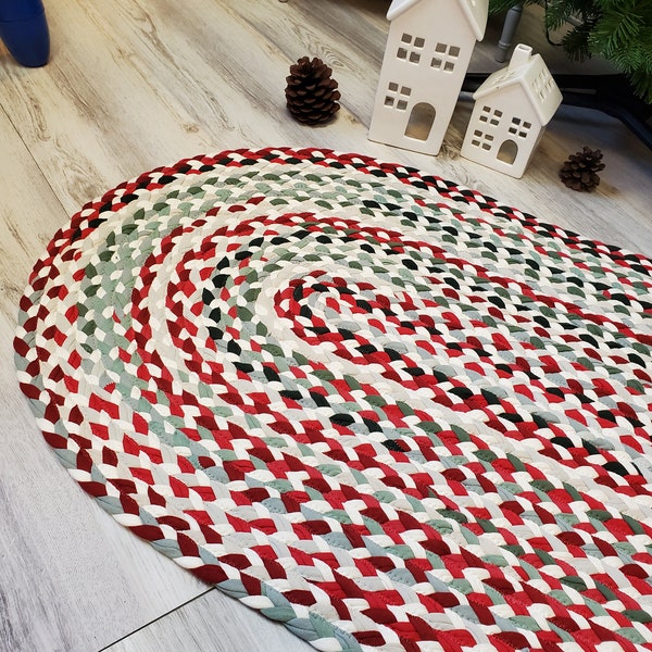 24"x 40"  red, sage green and cream rug made from braided cotton jersey