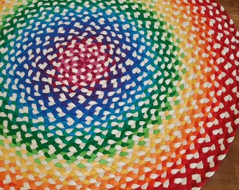 rainbow braided rug created from new and recycled t shirts