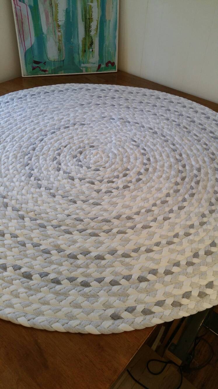 gray and white nursery rug