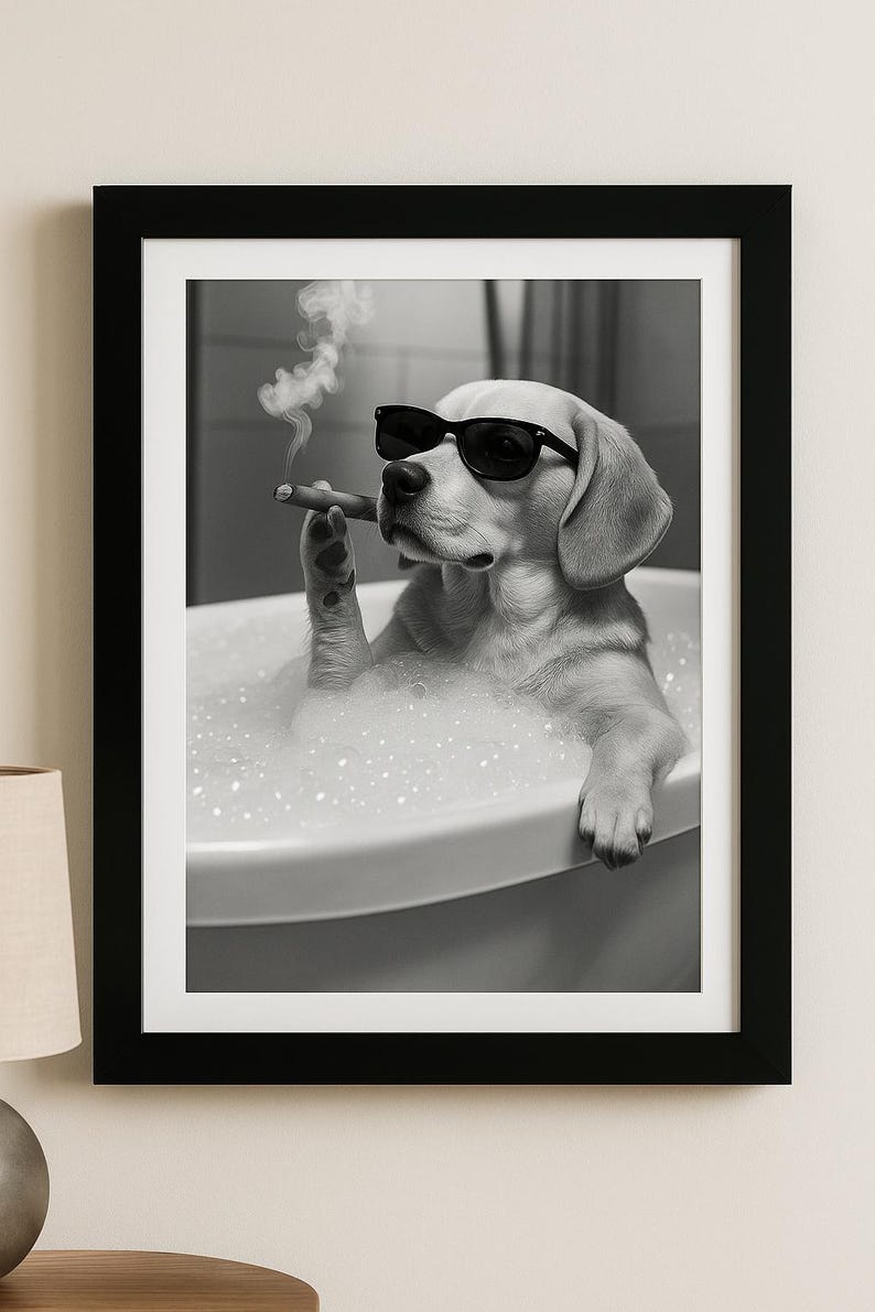 May include: Black and white framed print of a dog in a bathtub, wearing sunglasses and smoking a cigar. The dog is surrounded by bubbles, creating a humorous and relaxed scene. The image is a grayscale photograph.