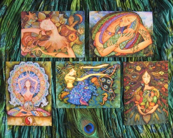 May include: Set of five illustrated greeting cards featuring colourful, whimsical artwork. Each card depicts a different female figure surrounded by nature elements, including flowers, birds, and fish. The cards are perfect for sending a special message to someone you care about.