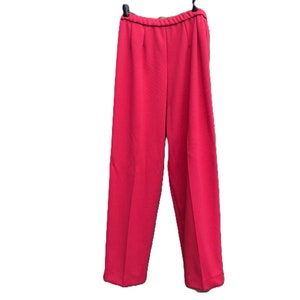 May include: A pair of red wide-leg pants with a straight fit.