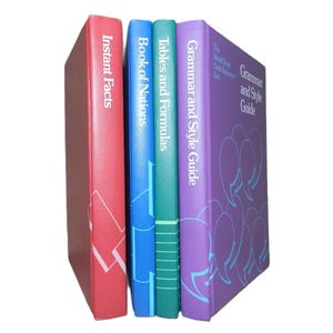 May include: A set of four books with colorful covers. The books are titled "Grammar and Style Guide", "Tables and Formulas", "Book of Nations", and "Instant Facts".