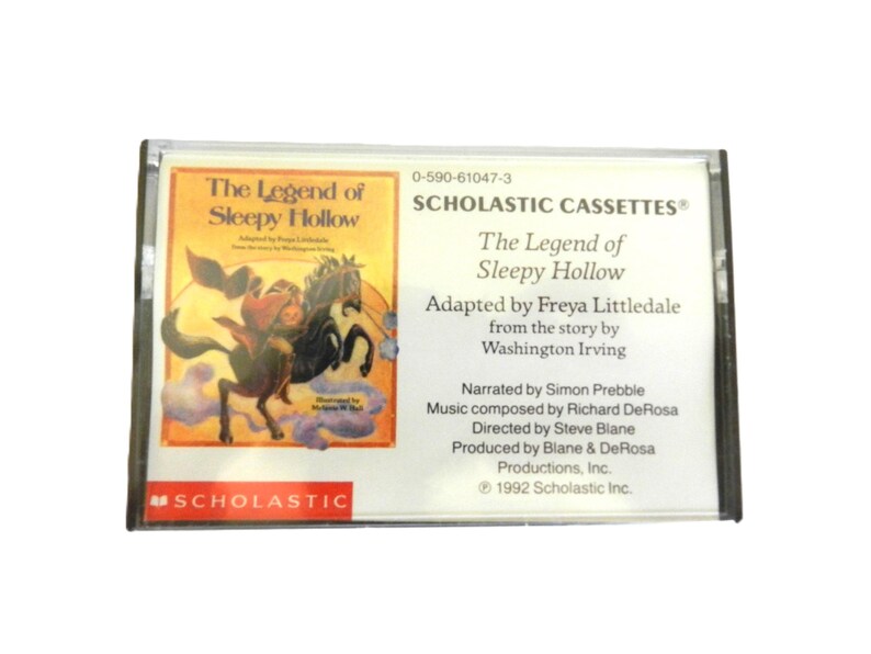 May include: A Scholastic cassette tape featuring the story "The Legend of Sleepy Hollow" by Washington Irving. The cassette tape is black with a white label and features a colorful illustration of a man riding a horse.