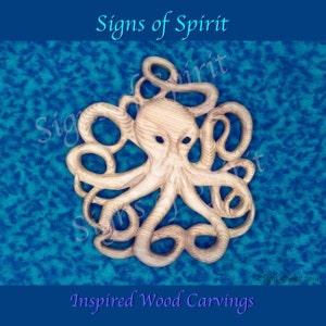 Escultura de polvo em madeira, totem animal para pendurar na parede.